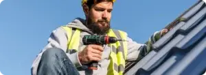 Roofing professional working on a residential roof