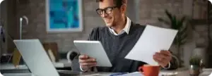 Financial advisor reviewing documents with a client