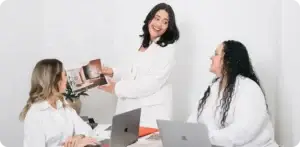 Upwynn Marketing team members in red and white outfits