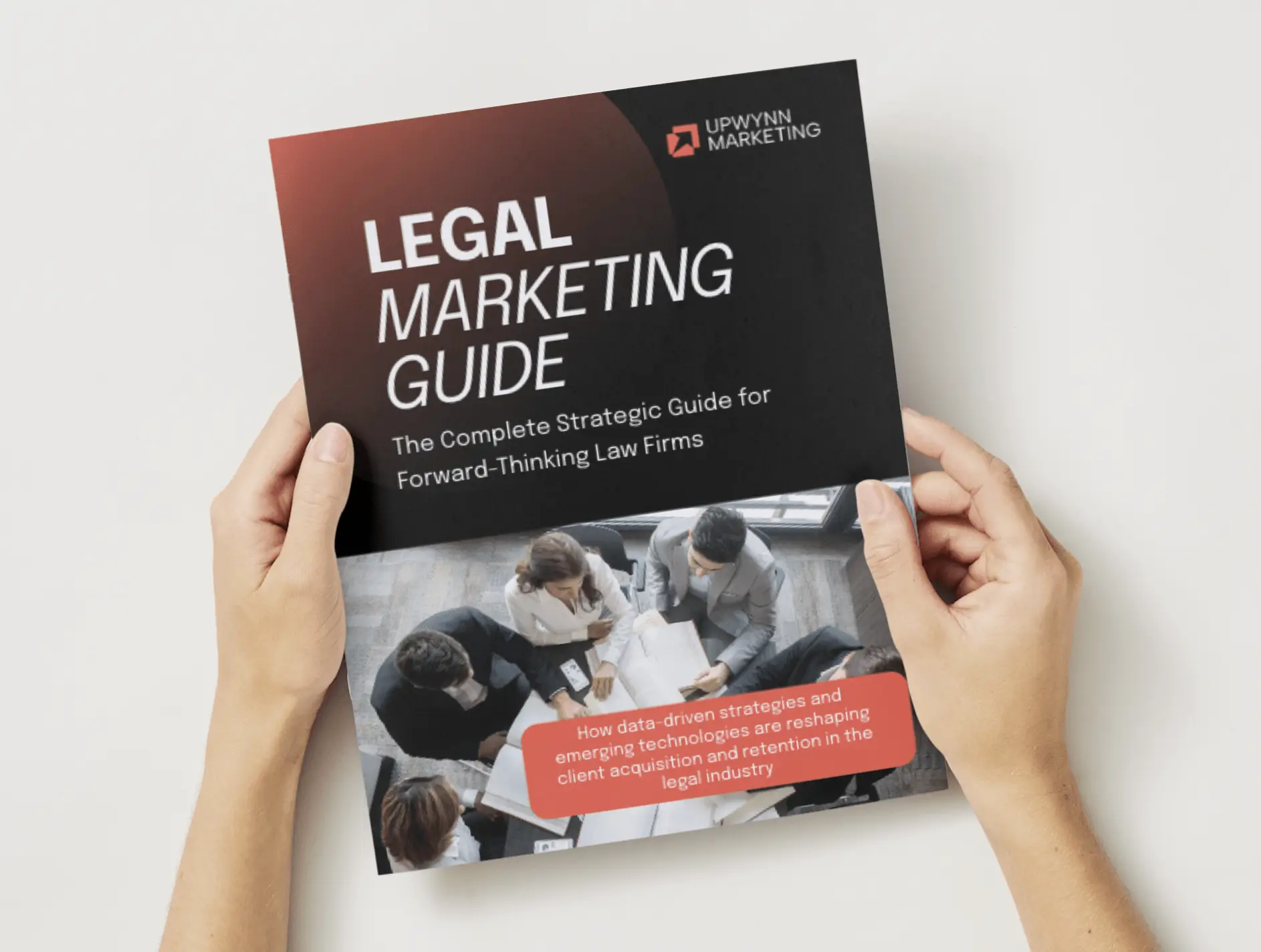 Hands holding Upwynn Marketing’s “Legal Marketing Guide,” featuring data-driven strategies and emerging technologies for law firms.